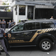 Police officers outside the residence of Brazil’s former President Luiz Inacio Lula da Silva in Sao Paulo.